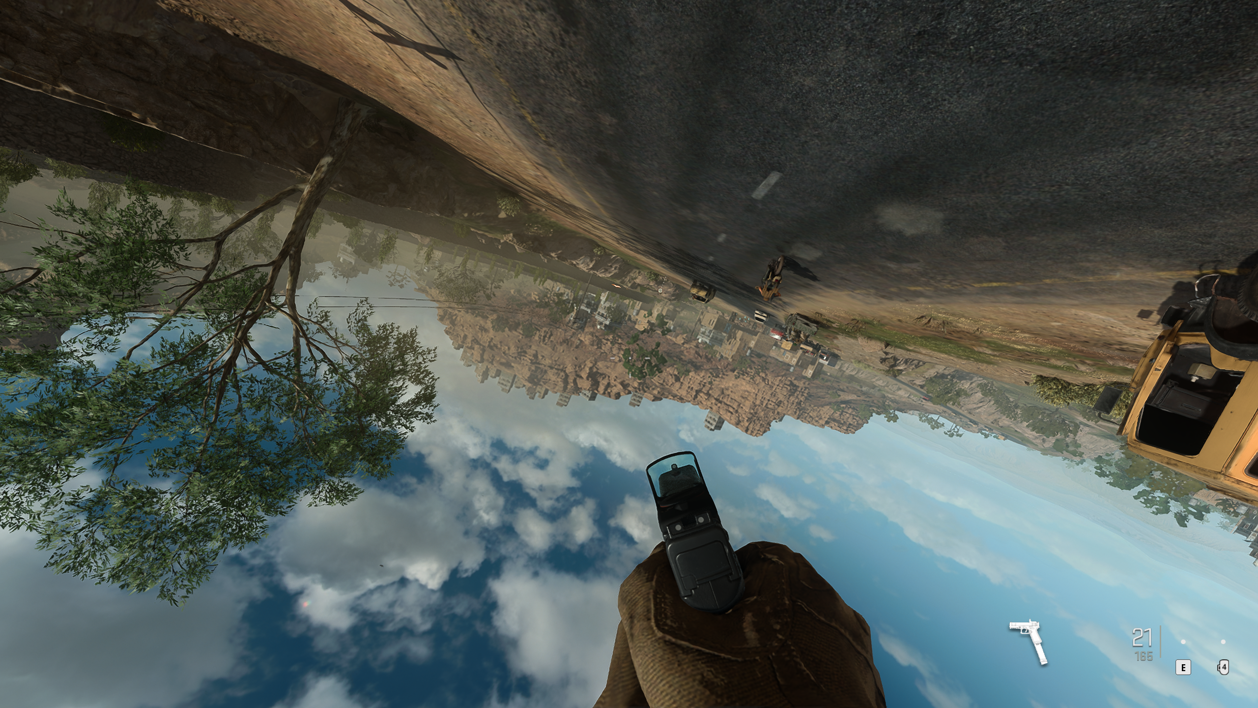 View of player shooting whilst upside down from helicopter