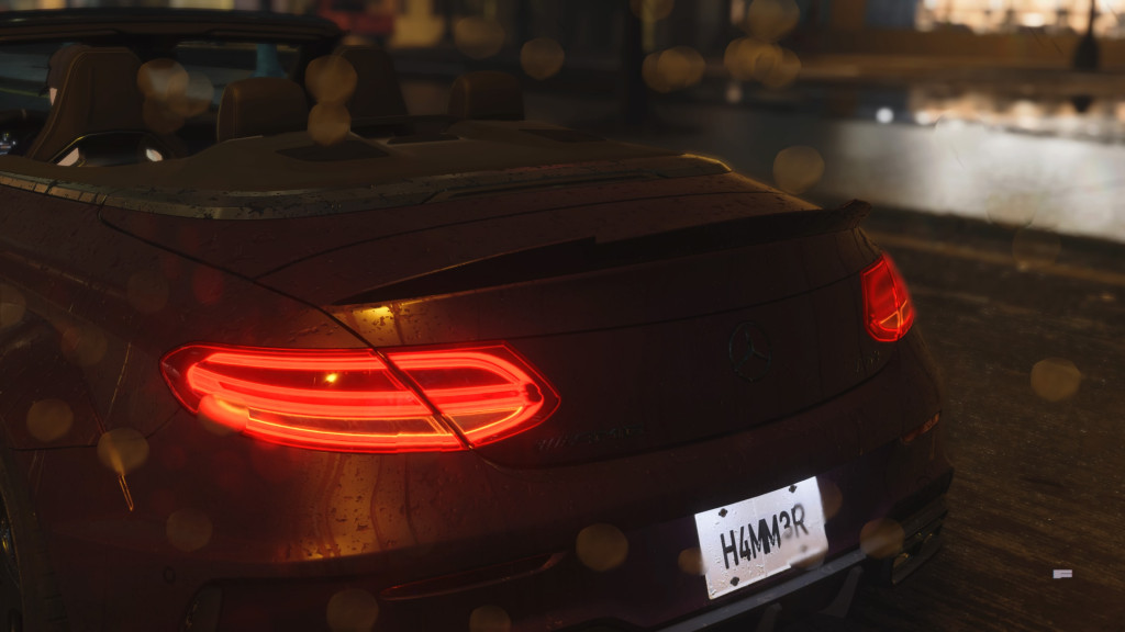 screenshot to show the rear end of a rival car in black with red tail lights