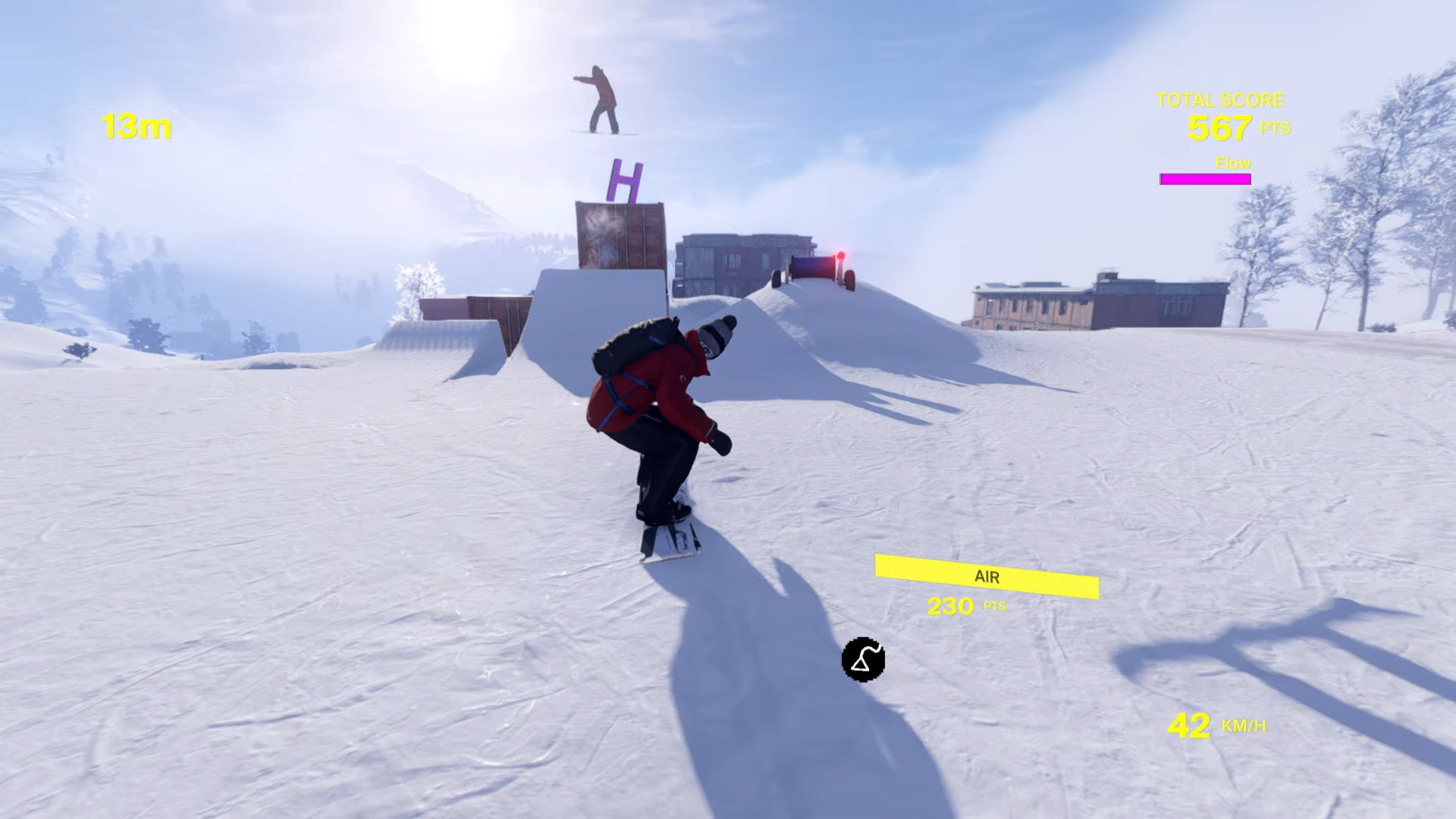 Gameplay screenshot of Shredders on PS5 showing the player following an computer controlled character in the center wearing a red jacket, black trousers, a grey bobble hat and a black backpack on their back, hunched down as they line up for a jump onto the top of a steel container. The computer controlled chatracter is mid jump about to land on the steel container. The games heads up display shows the players total trick score in the top right which reads 567 points. The bottom right shows the players current speed which is 42km/h. The top left reads 13m which is the distant between the two characters performing the jumps