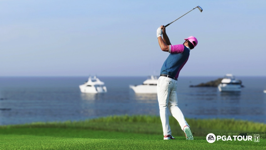 A golfer is in mid-swing with golf club held aloft in the foreground. The sea with three yaghts are in the background