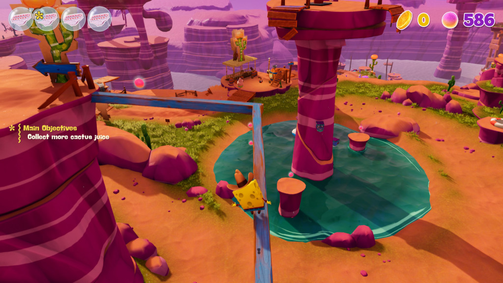 screenshot showing spongebob traversing a narrow blue beamed platform. There is a long drop down onto the floor below. The scenery is colourful with pink rocky spires, a blue pond and the brown dirt.