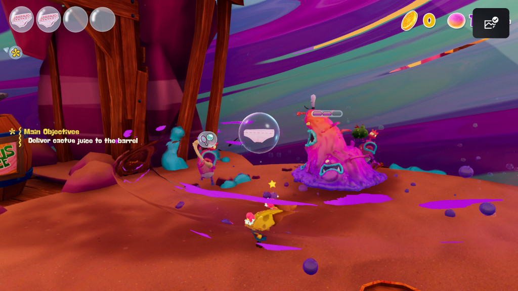 screenshot showing SpongeBob in combat. The area is enveloped in a purple and blue forcefield that prevents him from leaving. Infront of him are a couple of monsters that are pink with gawping blue mouths and 2 white spikey teeth.