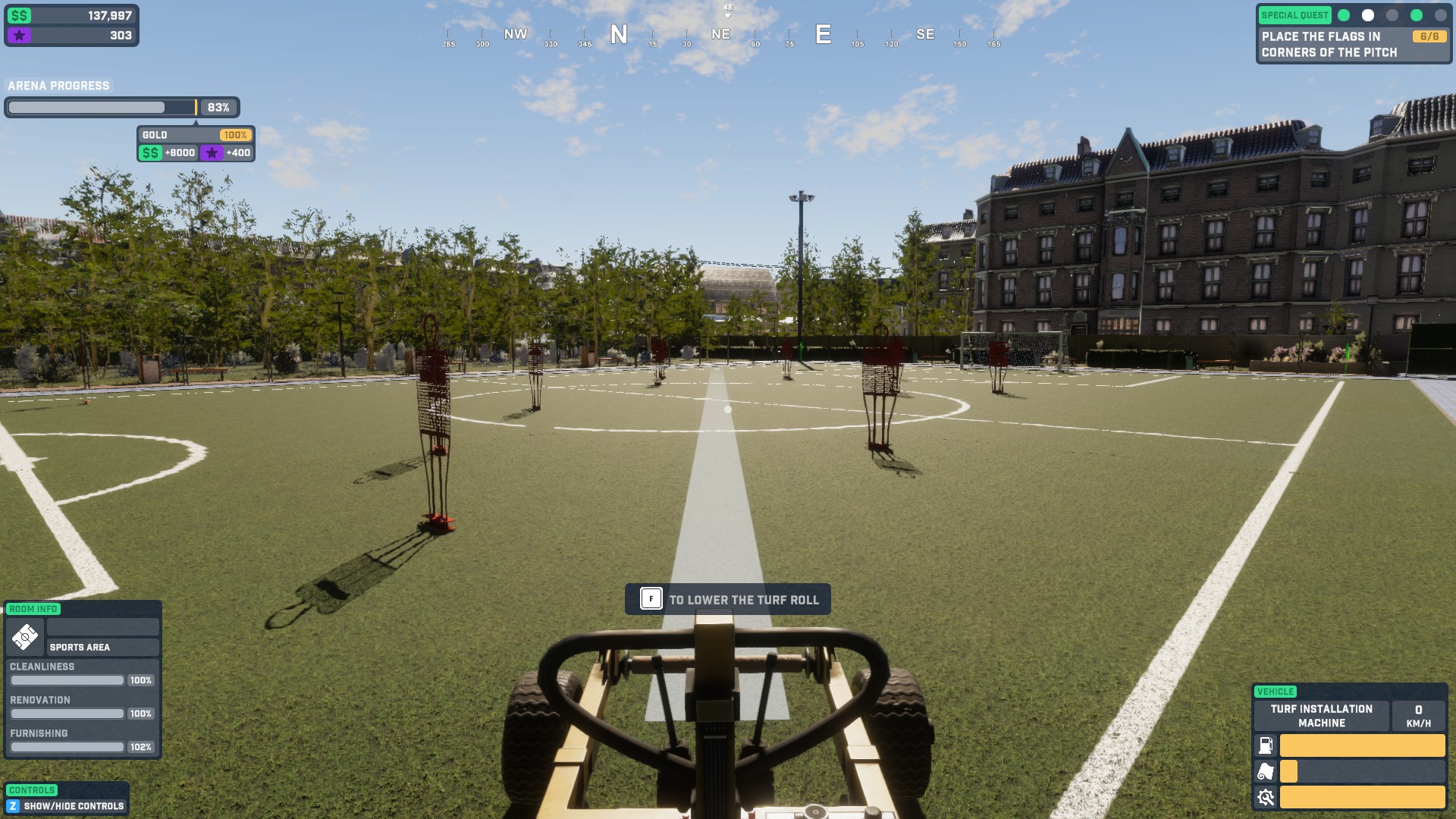 A football pitch with several training dummies scattered around. The [layer is pushing a Turf machine to repair any damage on the field. Large building to the right is overlooking the field.