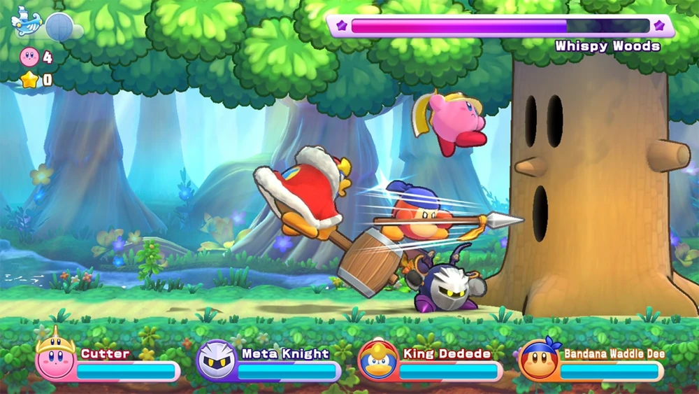 Kirby's fighting the Whispy Woods boss in a woodland background level with 3 friends
