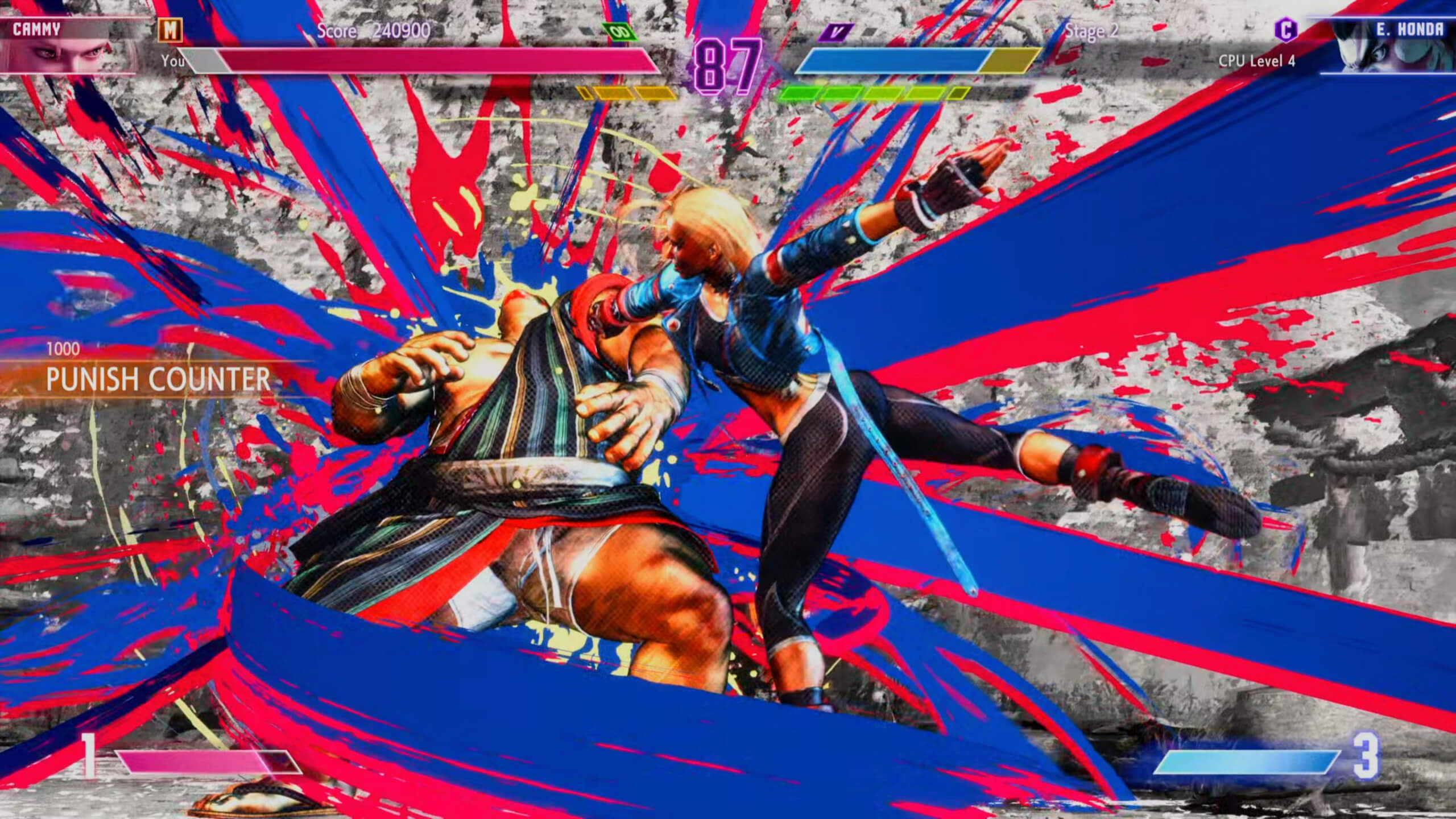 Cammy from Streetfighter 6 delivering a punish counter attack to E.Honda in an arcade mode match. The screen is emblazoned with with red and blue paint slashes to accentuate the special attack