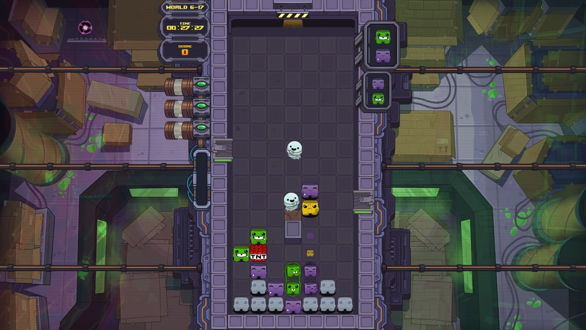 One of the levels later in the game. Several ghosts are bouncing around while a block of dynamite is stacked with two greens.