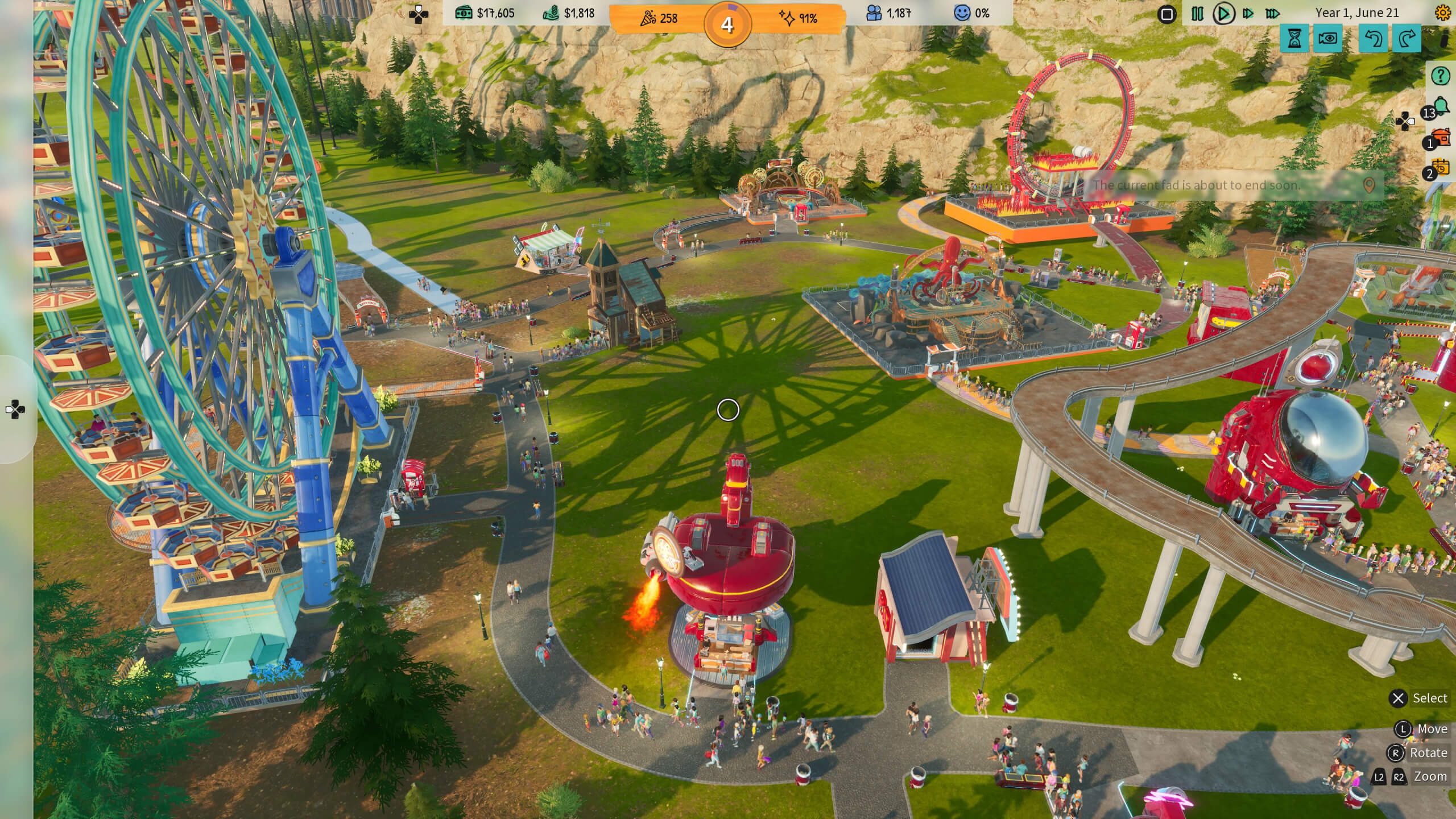 A Theme Park showing a variety of different rides including a ferris wheel. People walk along the winding paths in groups. There are also several food and drink booths available, At the top of the screen it shows your visitor count and park happiness. 