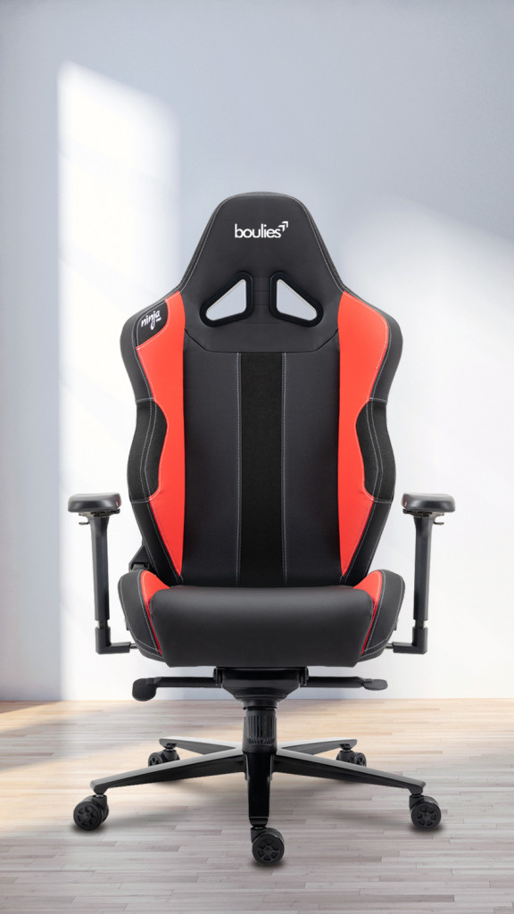 A red Ninja Pro Chair in a white room