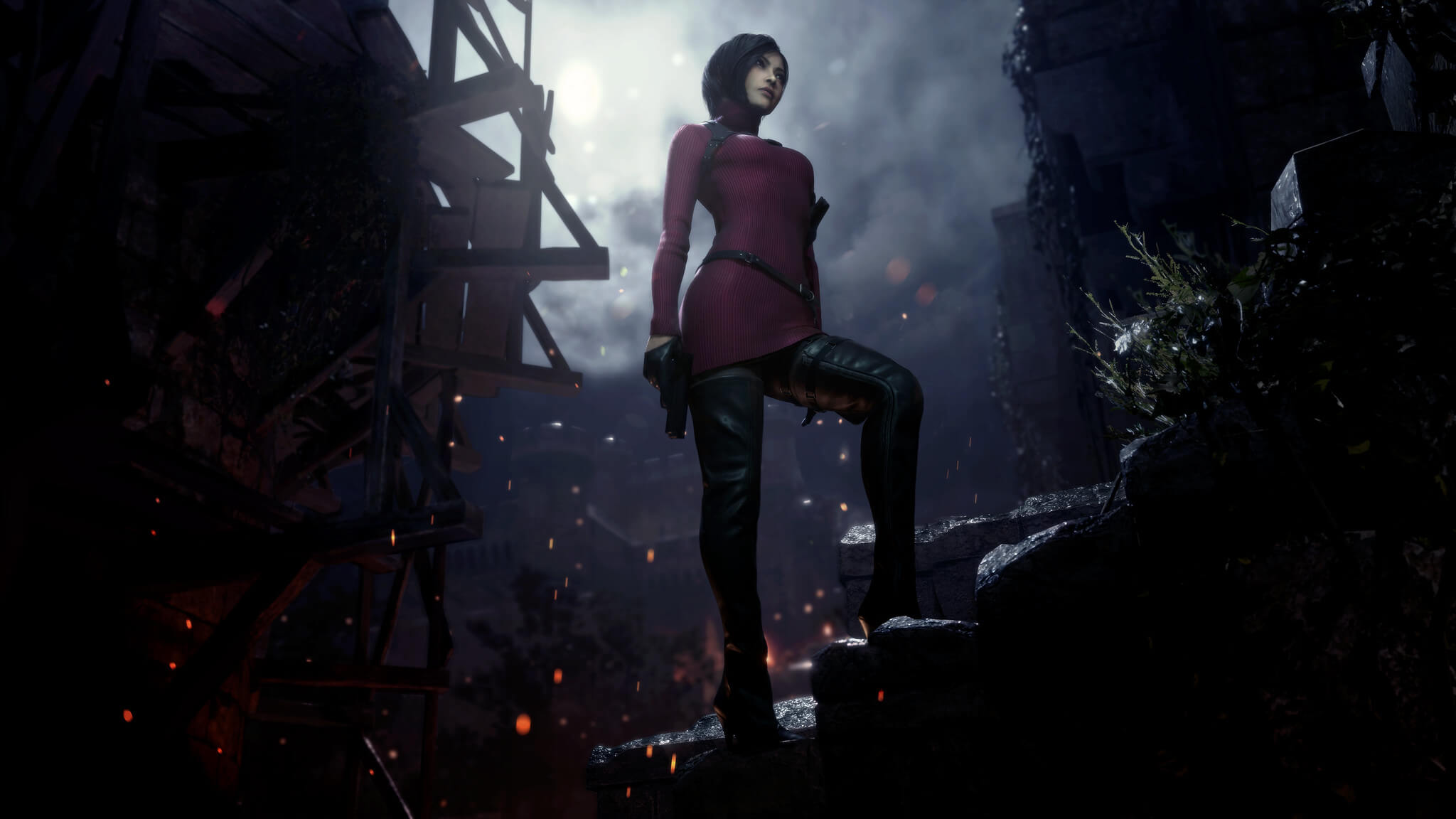 Ada Wong stands in the ruins of a house that is still smoldering. The moonlight is behind her.
