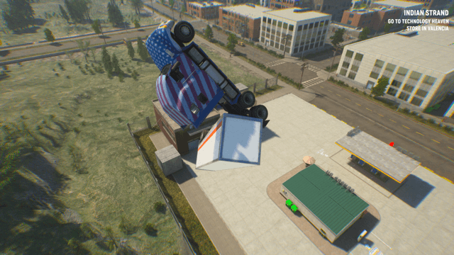 An aerial shot of a garage with a few apartment blocks the other side of a road that runs through the scene. In the foreground and an estimated 30 meters off the ground is your truck quite casually flying through the air. The dulcet tones of R Kelly form in your mind. 