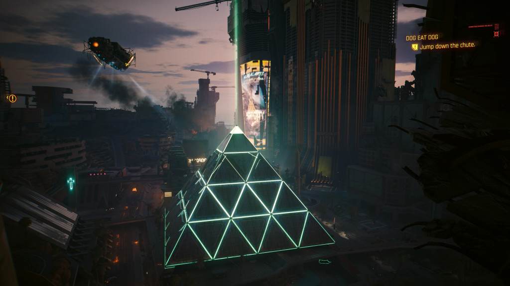 A bleak and darkly lit futuristic cityscape with a neon outlined pyramid centre screen.