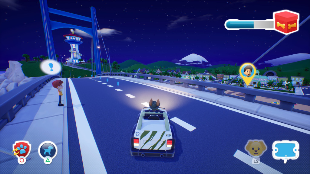 screenshot showing Tracker in his safari white vehicle. He is seen driving across across the adventure bay bridge. It is night time and the vehicle's headlights shine on the road. Standing on the left is a boy with an blue exclamation within a white bubble indicating that he has a mission for us.