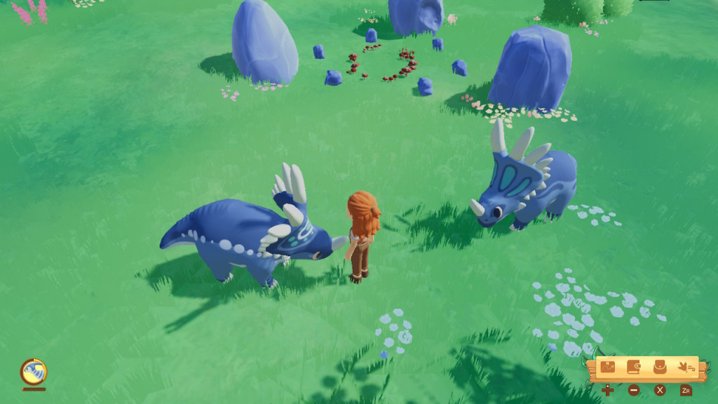 Screenshot showing a lush green field with a 3 large grey boulders in place. Beside our character are 2 grey and blue triceratops. 