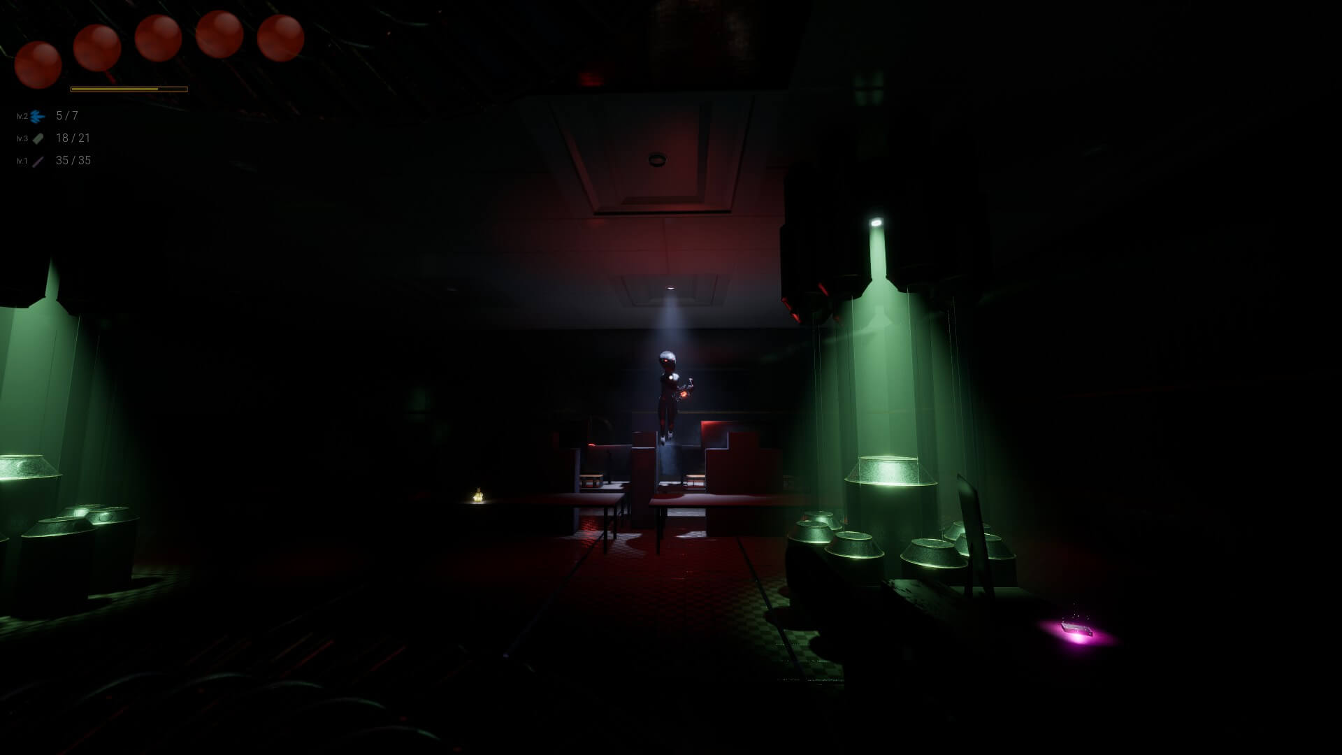 One of the enemies staring me down and preparing to attack. The area is very dark and I'm using the metal contraption on the right to help illuminate the space.