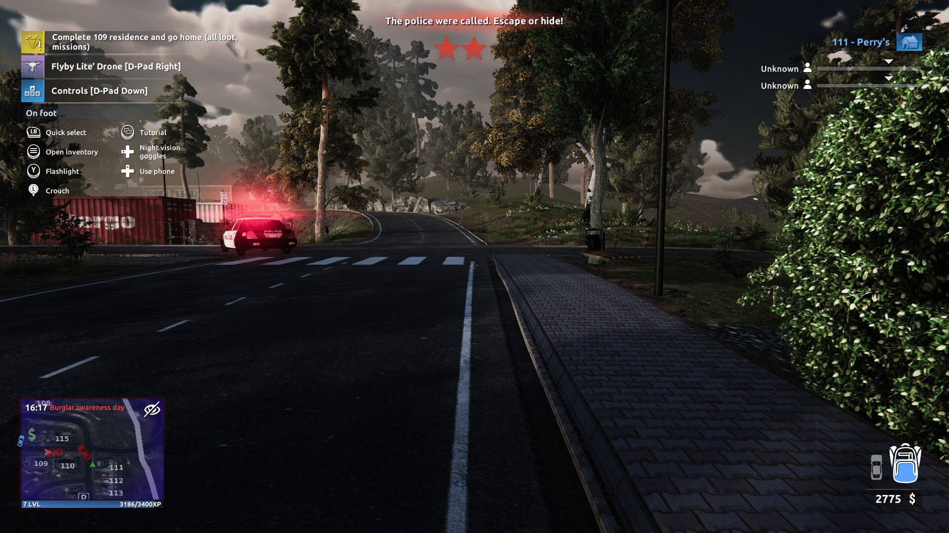 I have a two-star wanted level, the police car is directly in front of me and the officer has begun to look for me. The mini-map in the bottom left flashes red and blue while I'm being chased.