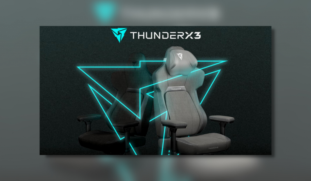The image has a black background with a bright blue neon shape outlined. In between this neon shape there is a ThunderX3 Gaming Chair in a grey colourway.