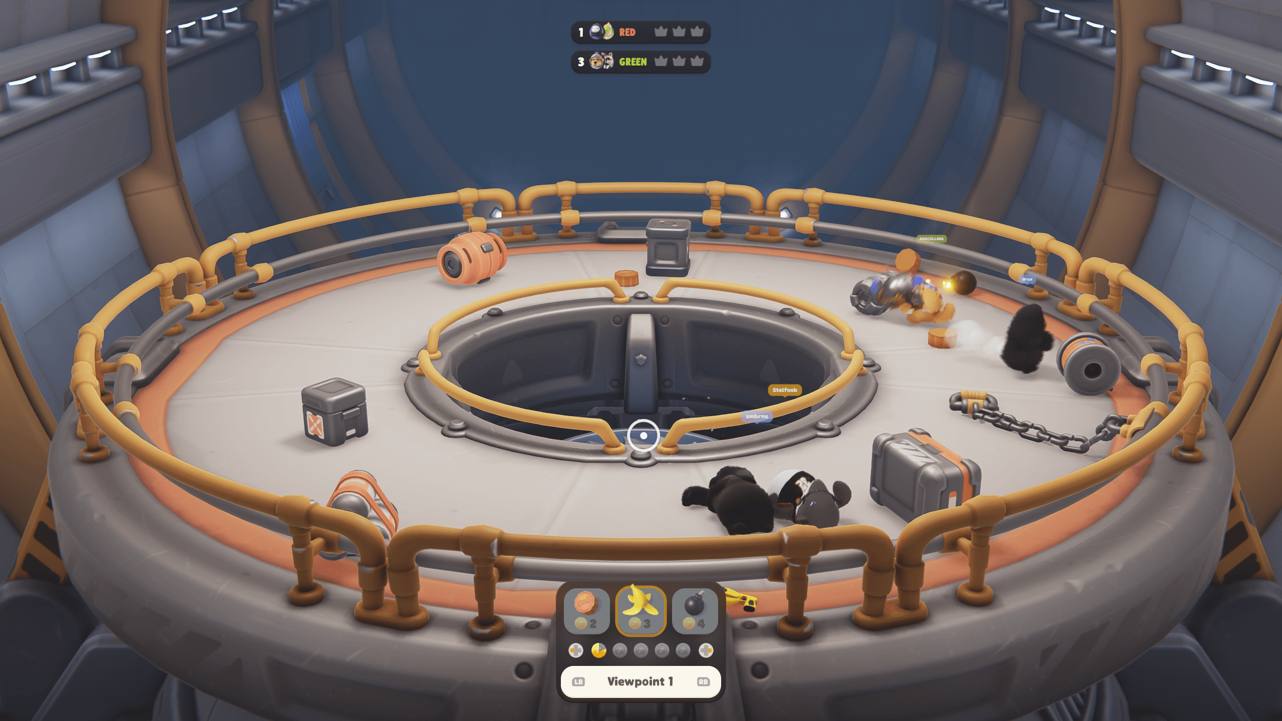 A screenshot of one of the game maps. It is a ring with blades in the middle. You can see animals knock out on the ground as well as variety of crates. 