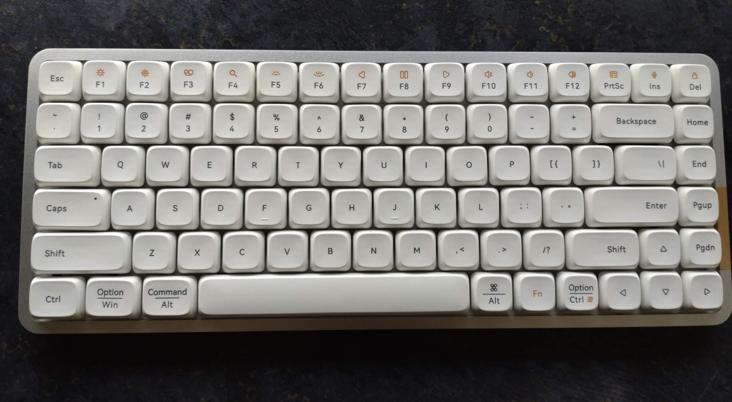 A full view of the Lofree Flow keyboard in white.