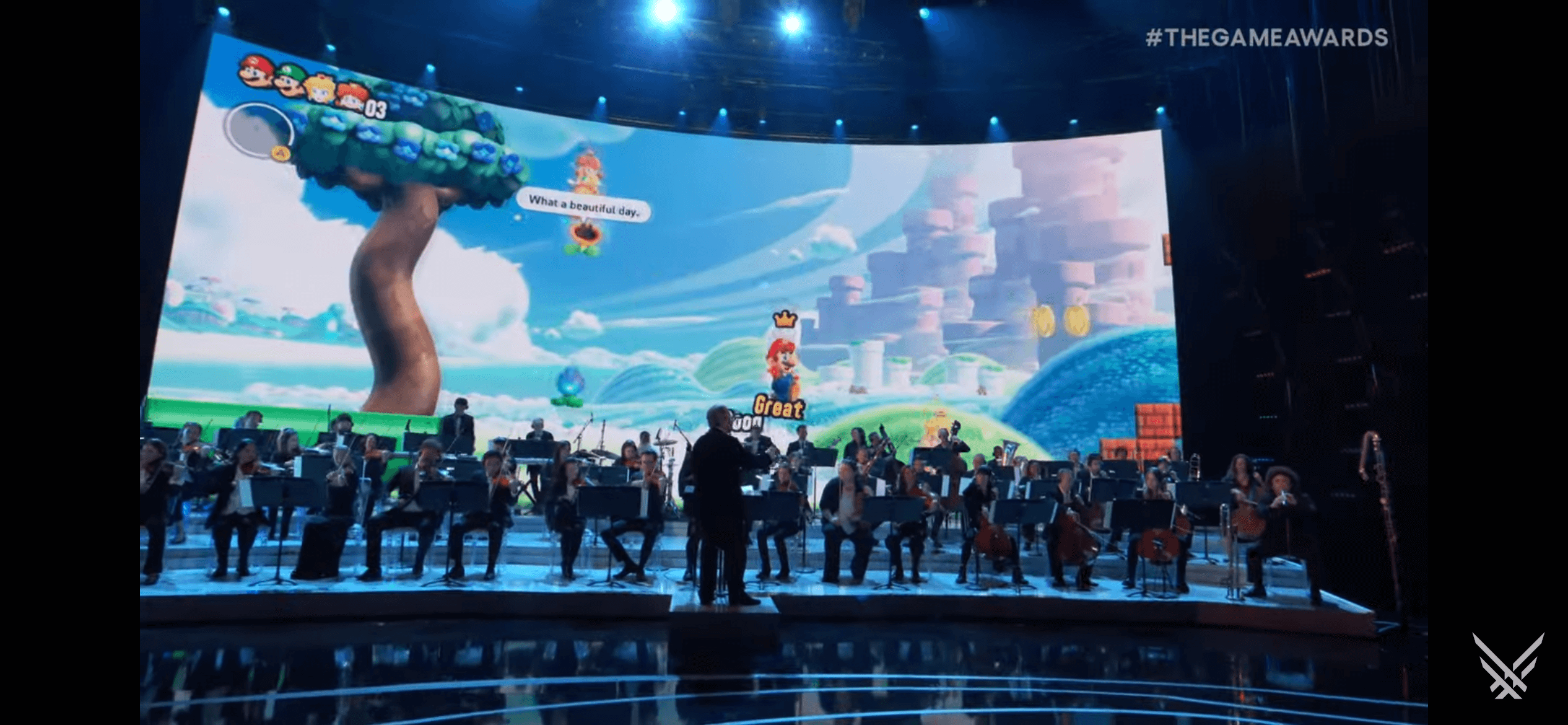 The game awards orchestra playing music while displaying many games in the background.