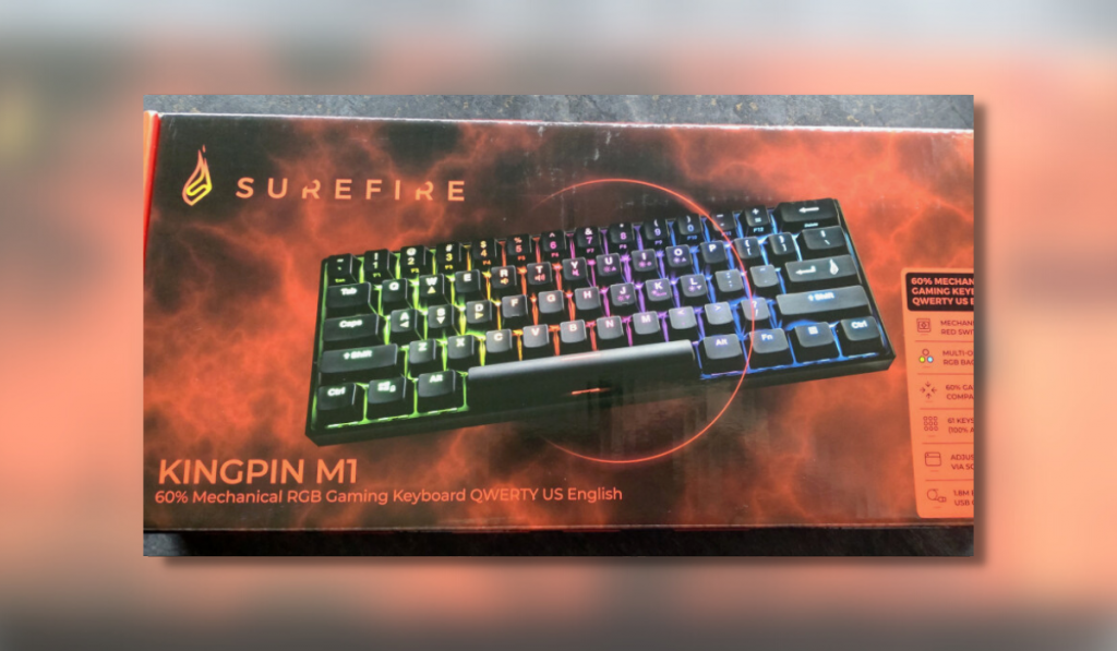 A box with a picture of (and containing) the Surefire Kingpin M1 Mechanical Keyboard.
