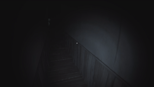Walking down a dark dank corridor. On the left peeking from the corner is a mannequin wearing a medical mask. The mannequin suddenly disappears around from the corner.