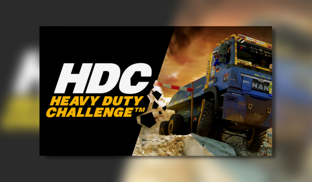 The title "HDC Heavy Duty Challenge" is presented on the left side with a black background. On the right half of the logo there is a blue with yellow heavy duty truck.