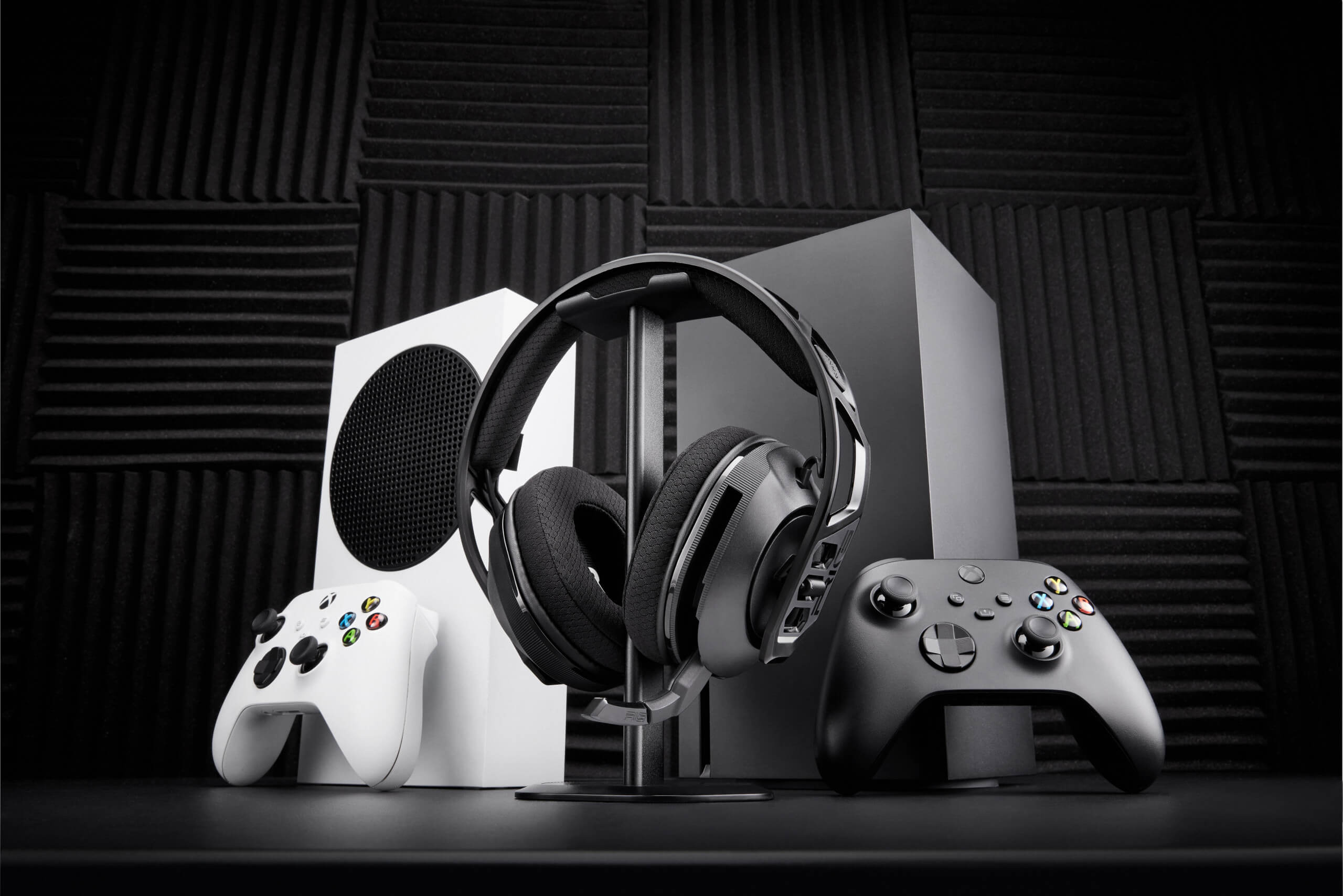the rig headset in front of both a series s and a series x console