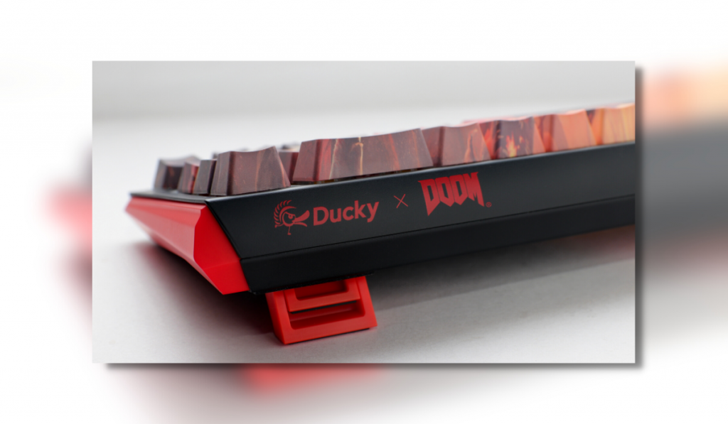 The Ducky X DOOM One 3 SF pictured from the back right corner highlighting the Ducky and Doom branding.