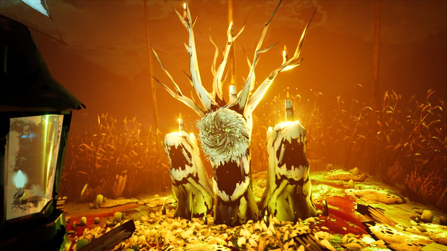 The effigy that the player uses to banish the creature. Each mouth can hold one fragment and lies in the middle of the field somewhere. The left screen has my lantern with a dim flame.