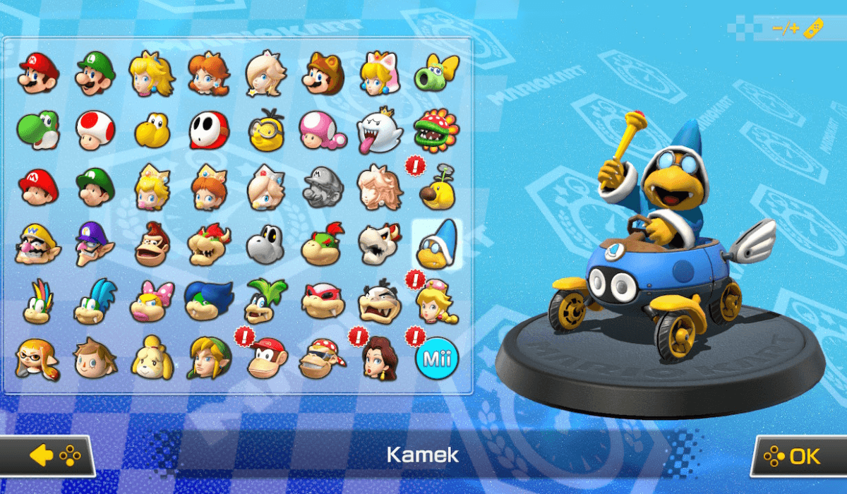 The character select screen from Mario Kart 8, which shows 6 new characters to select from the Booster Course Pass. These are highlighted with red exclamation marks. The racers are Diddy Kong, Funky Kong, Pauline, Peachette, Kamek, and Wiggler. Kamek is selected, and is larger on the right of the screen.