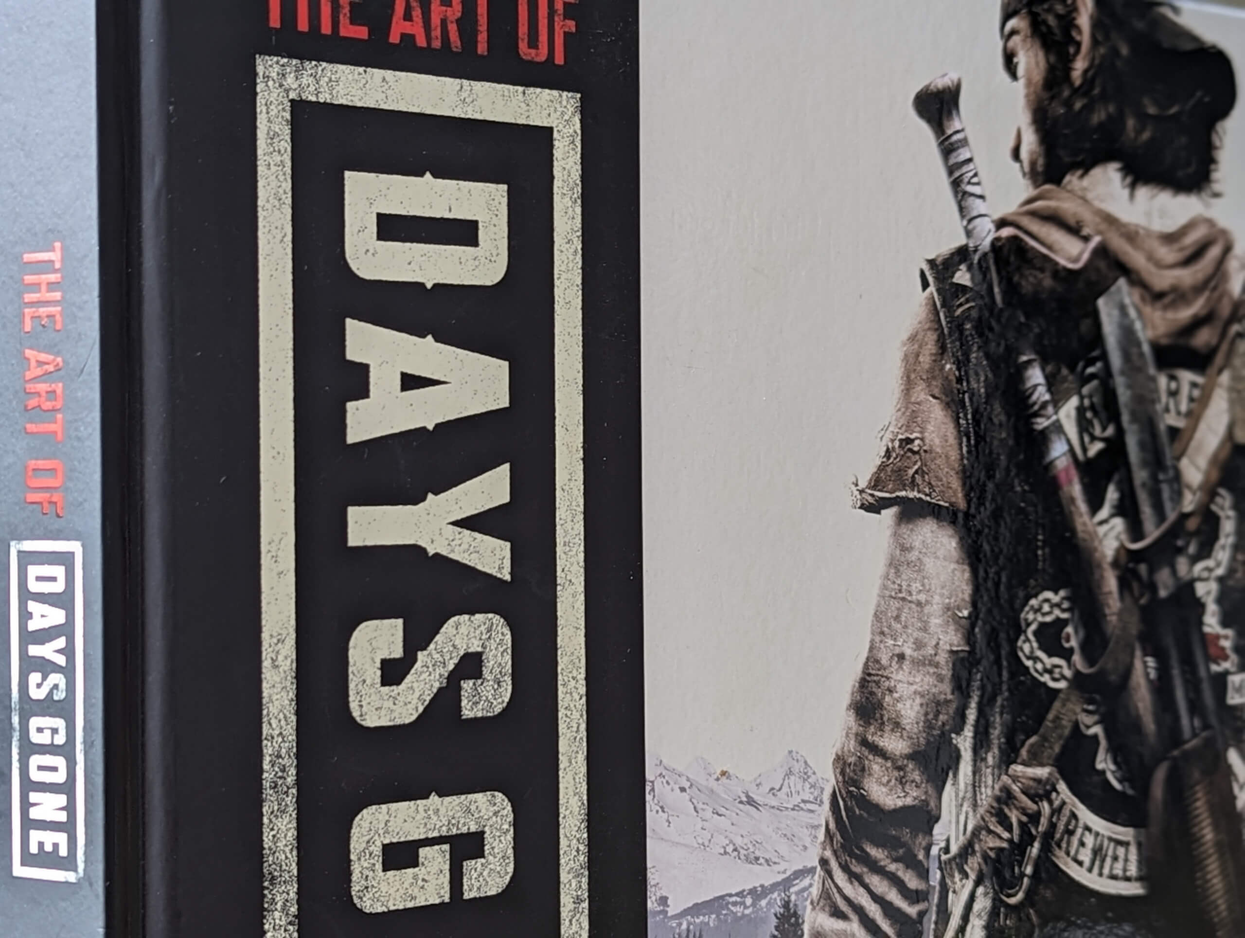 the front cover and spine of the Artbook "The Art Of Days Gone"