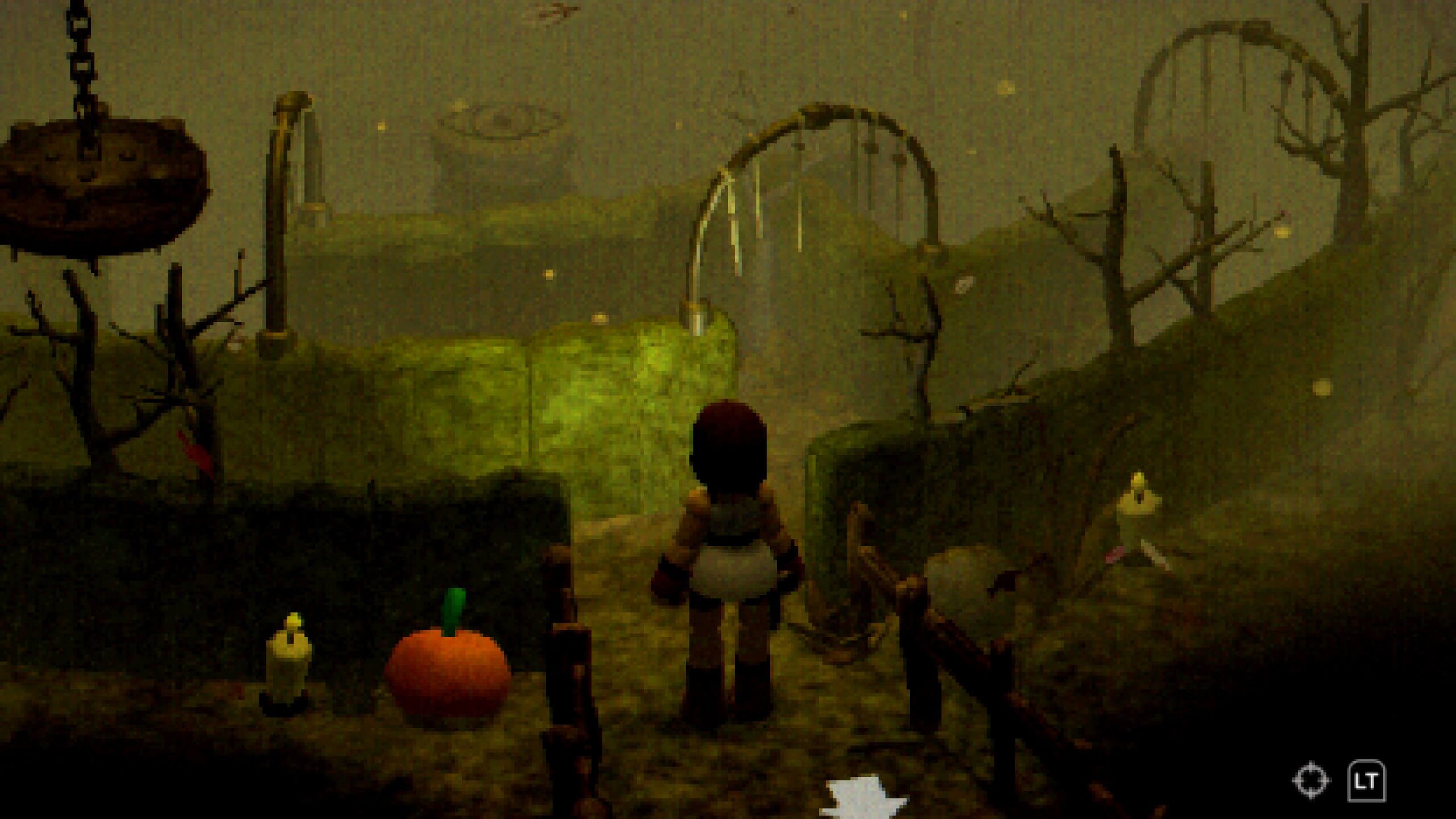 I'm standing at the start of a maze within the park. You can see three arches with something hanging down. In the distance is a stone-like object with an eye symbol.