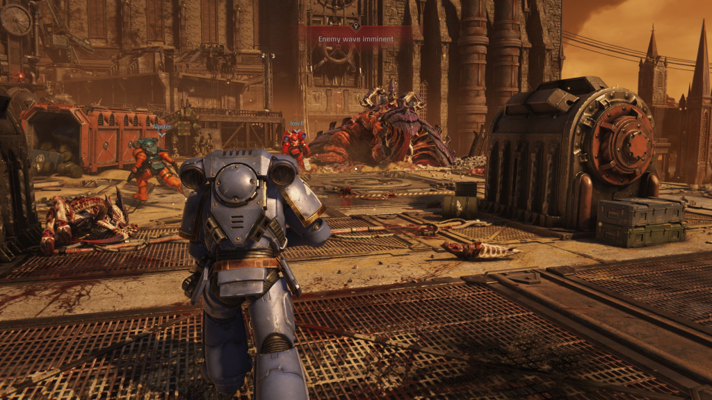 Sci-fi game scene with armored characters and a warning of an imminent enemy wave.