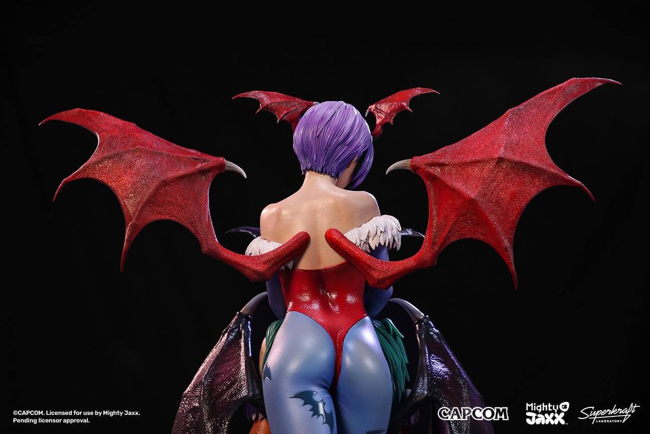 A detailed figure of a woman with purple hair and red bat wings, showcasing a colourful, stylized costume from a fantasy universe.