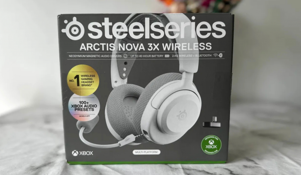 SteelSeries Arctis Nova 3X Wireless headset packaging featuring a sleek design, highlighting various audio features and Xbox compatibility.