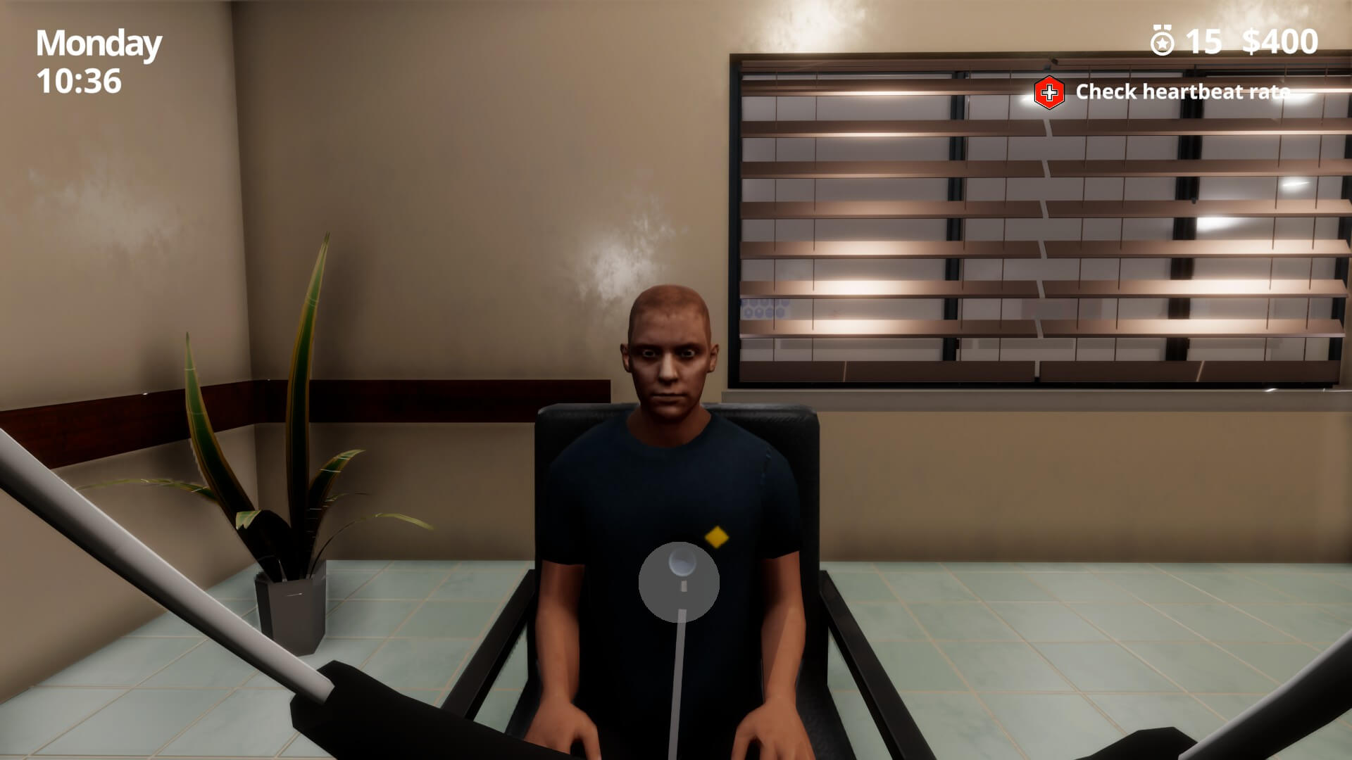 A patient sat in a chair while I use a stethoscope to examine his heart rate. 