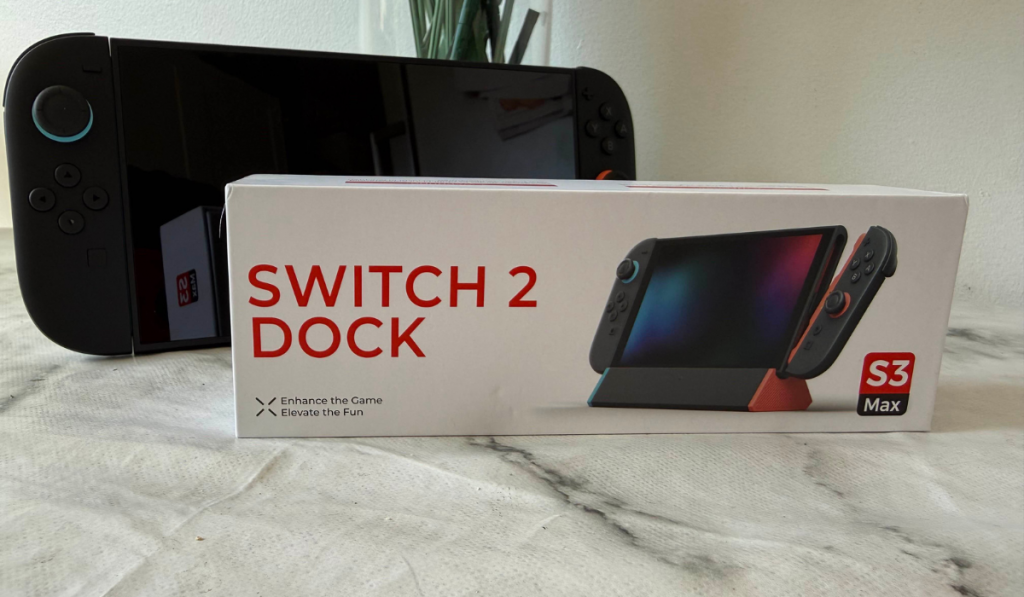 Switch 2 dock in front of a switch 2 console on a table