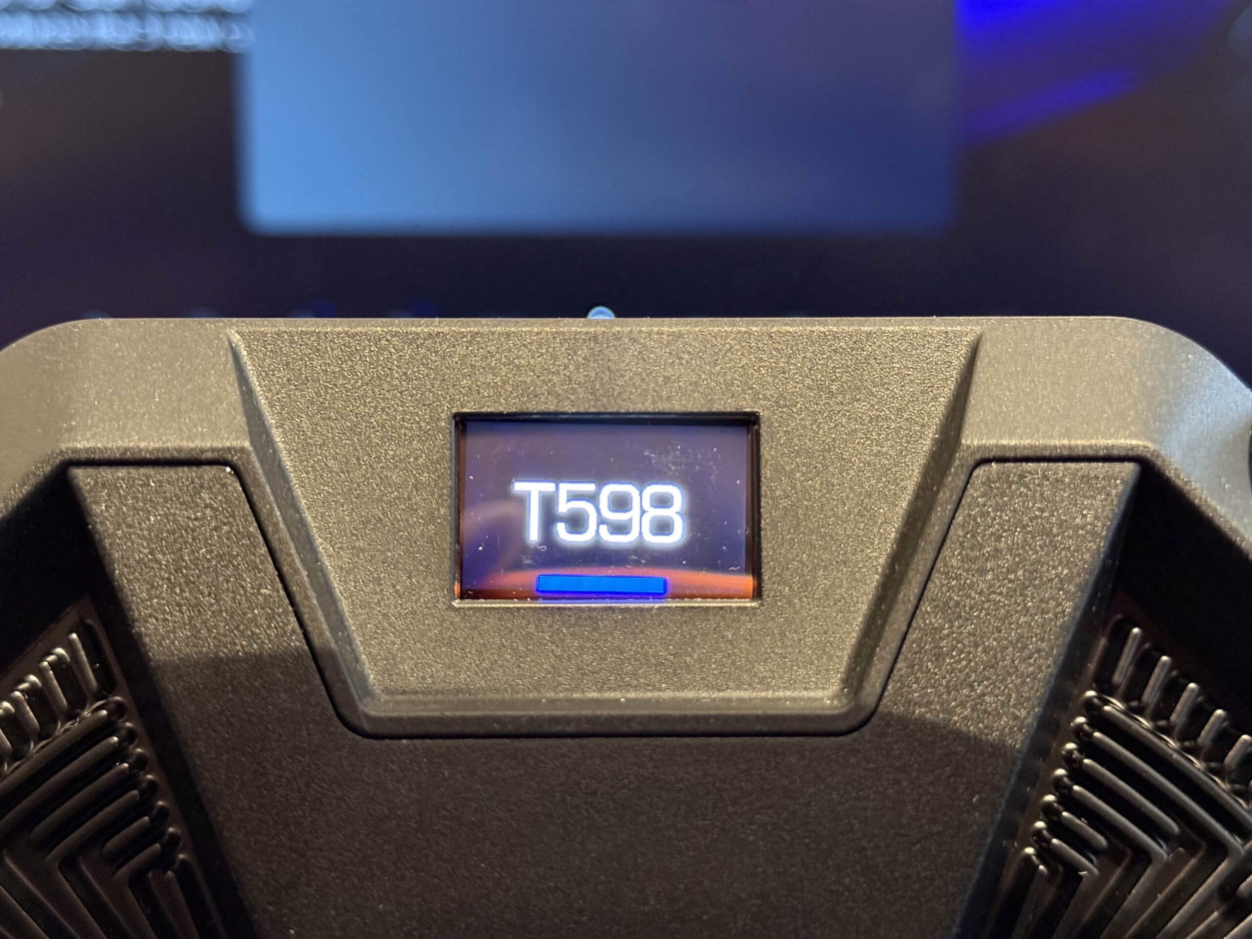 Thrustmaster t598 wheel screen with the text T598 on it
