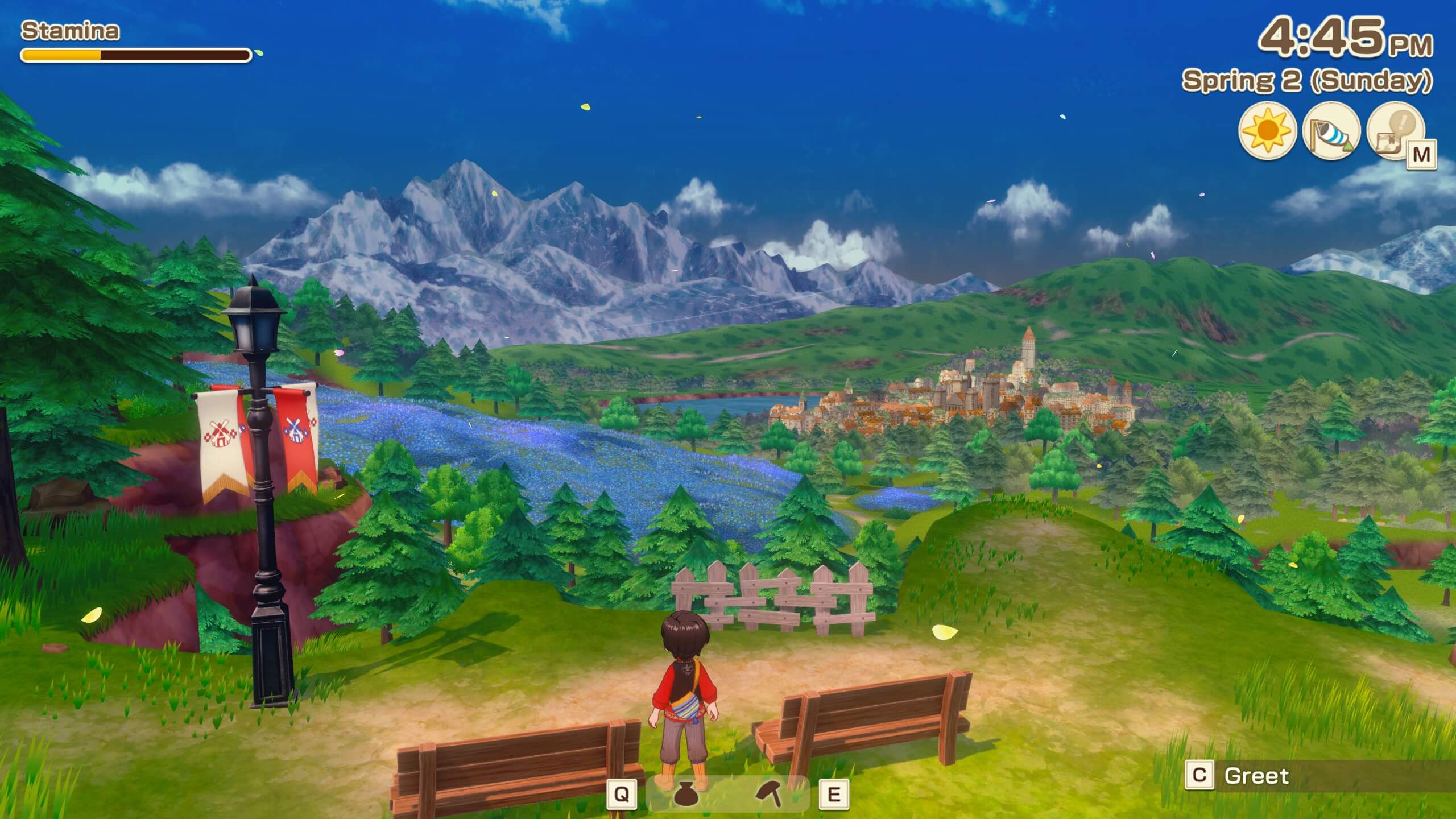 The farmer overlooking a large open area with a city nestled between the trees.