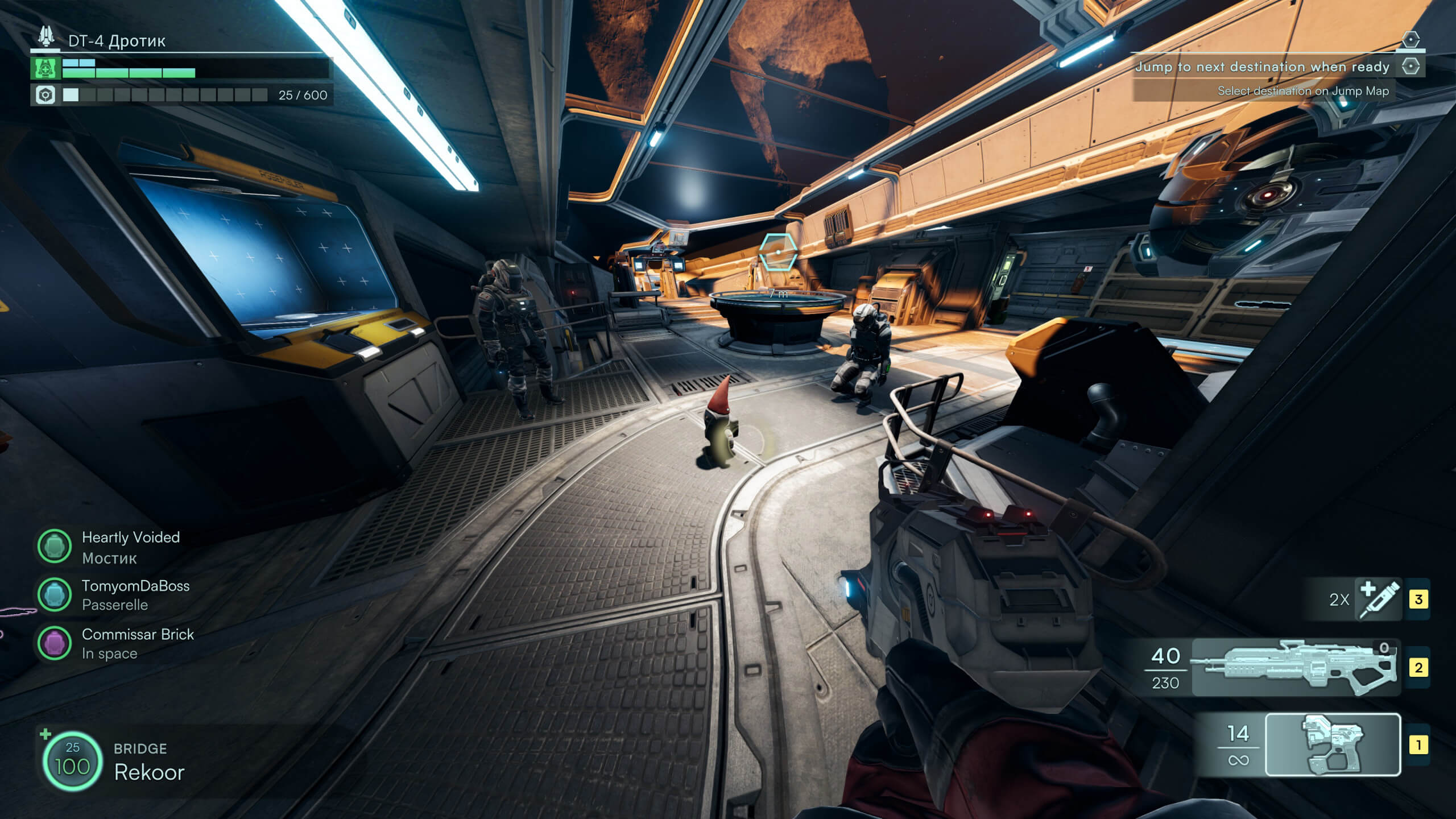 A small alien creature stands in a futuristic spaceship interior, surrounded by armored figures and advanced technology.