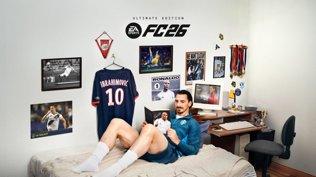 A man relaxes on a bed reading a magazine in a football themed room. Walls are decorated with kits, photos, medals, and posters. A computer and desk are cluttered with personal items. Text above reads, "Ultimate Edition EA Sports FC 26."