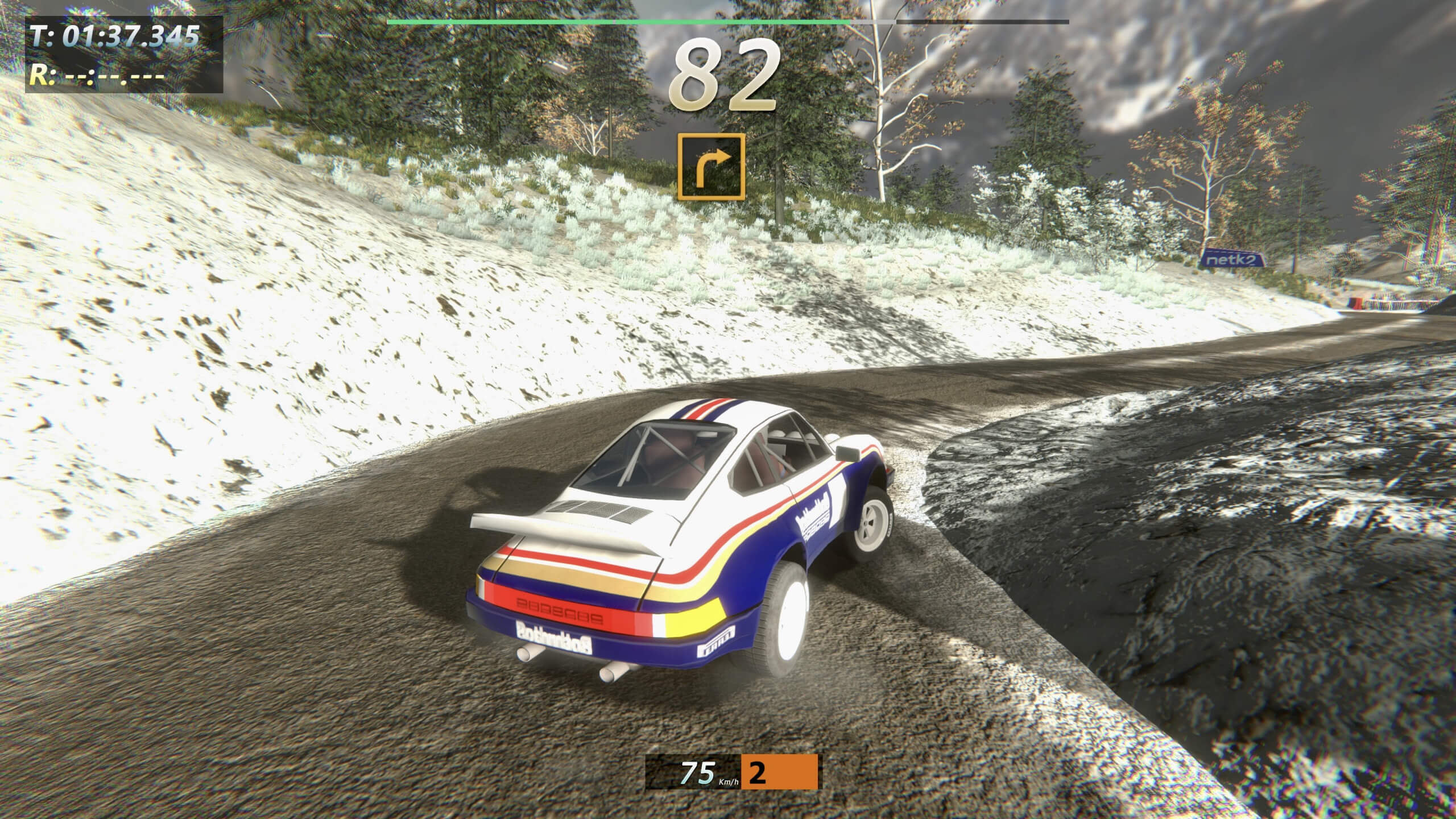 A Porsche rally car, making it's way through one of the stages in Rally Arcade Classics