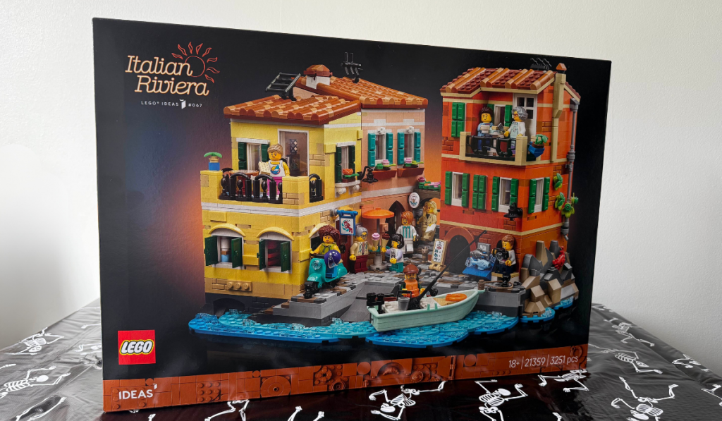 Front of the LEGO set box showcasing the vibrant Italian Riviera scene with colourful buildings, mini-figures, and a boat on the water.