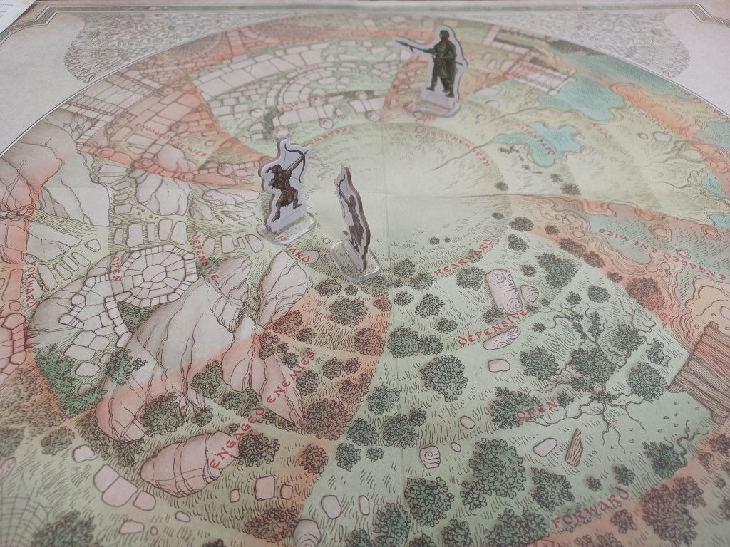 Battle Map of LotR roleplaying game with 3 figures on it.