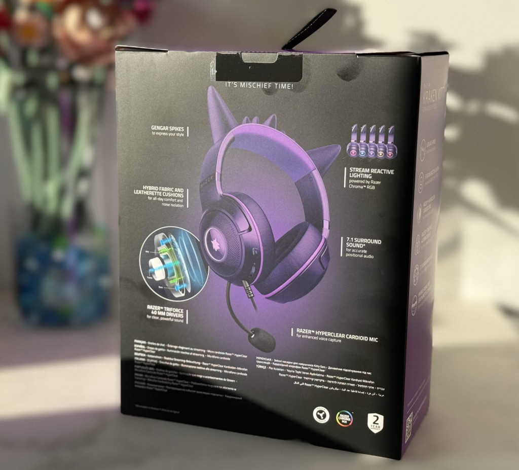 Back view of the Razer Kraken Kitty V2 Gengar Edition Headset box highlighting features like surround sound, reactive lighting, and cushioned ear pads.