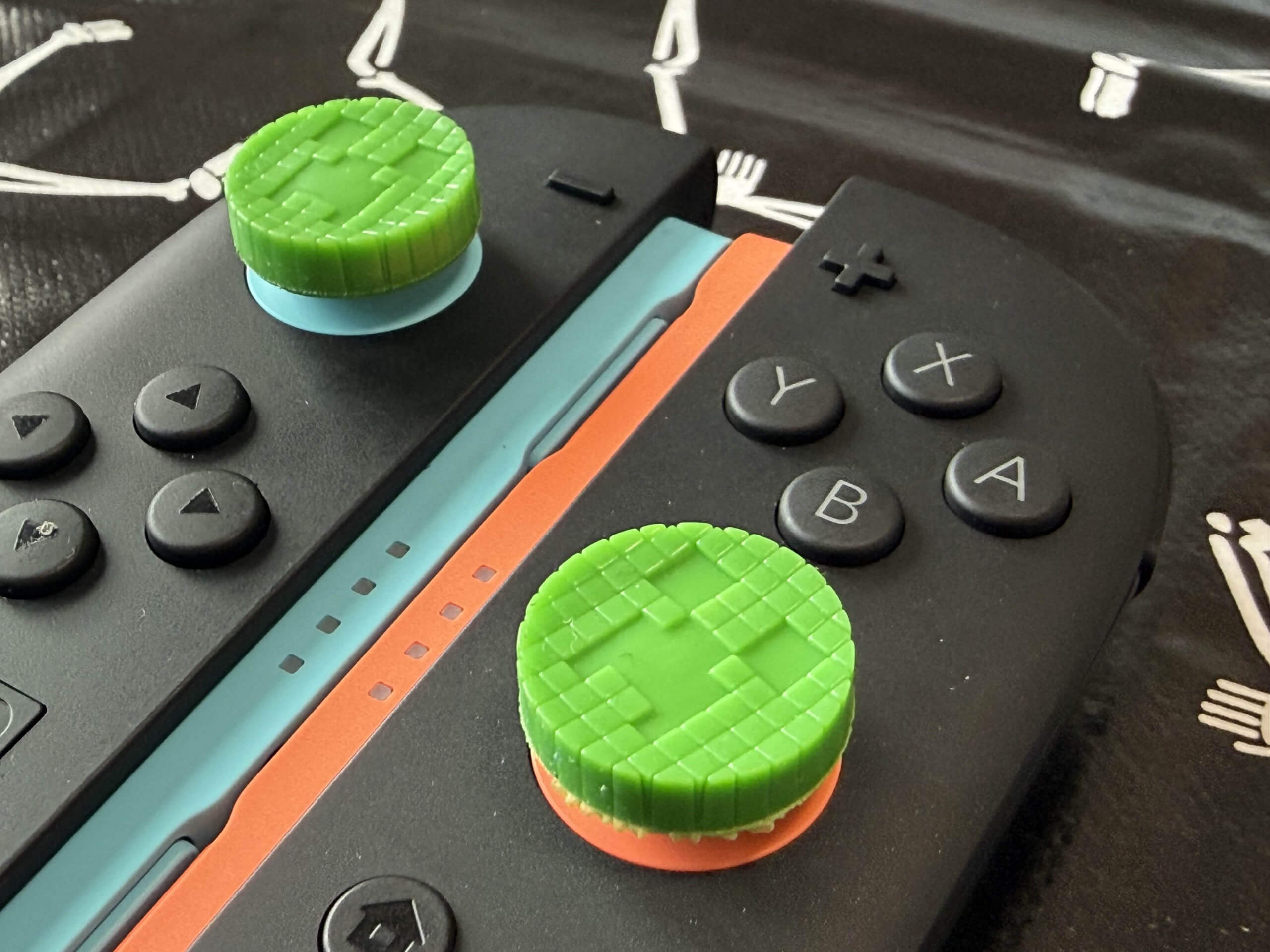 image of the KontrolFreek Minecraft Creeper Edition thumbsticks on a set of switch 2 joycons