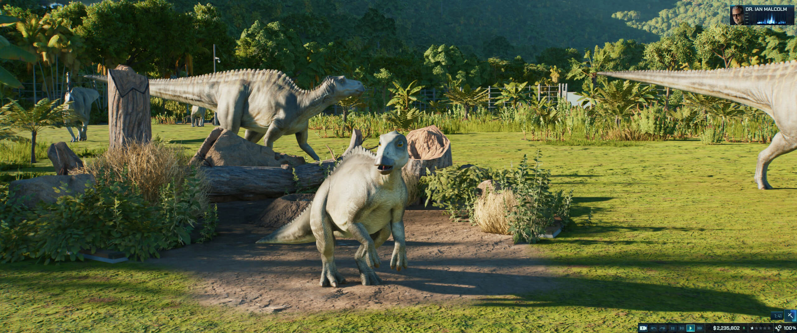 A lush green vibrant park featuring 3 medium sized dinosaurs being recalled by the ranger.