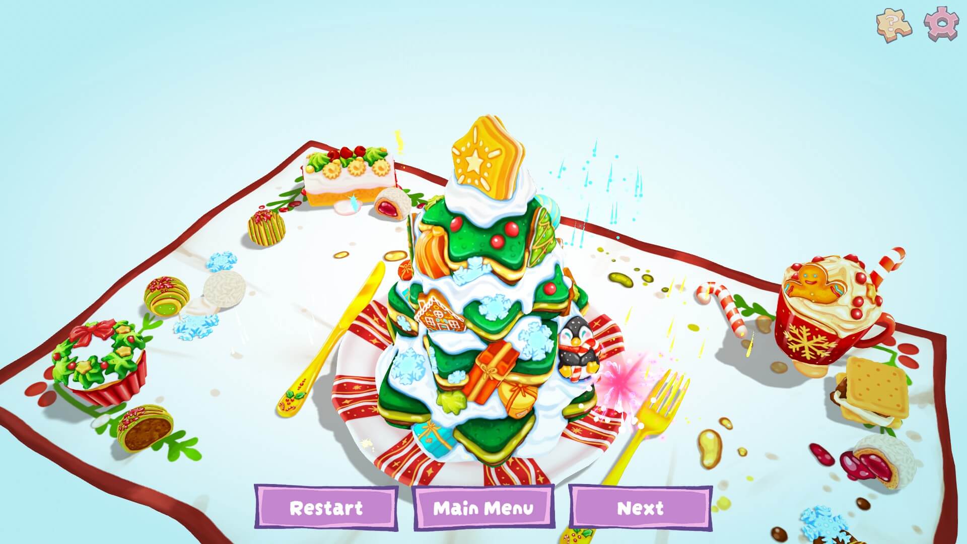 A festive Christmas desert in the shape of a tree. Around it are other items of food and drink, each matching the festive theme.