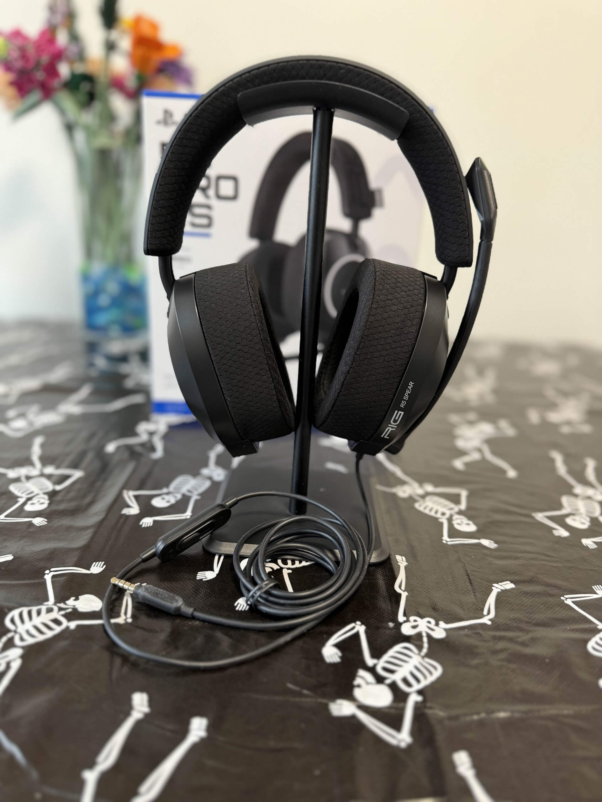 image of the RIG R5 Spear Pro HS headset on a stand on a table.
