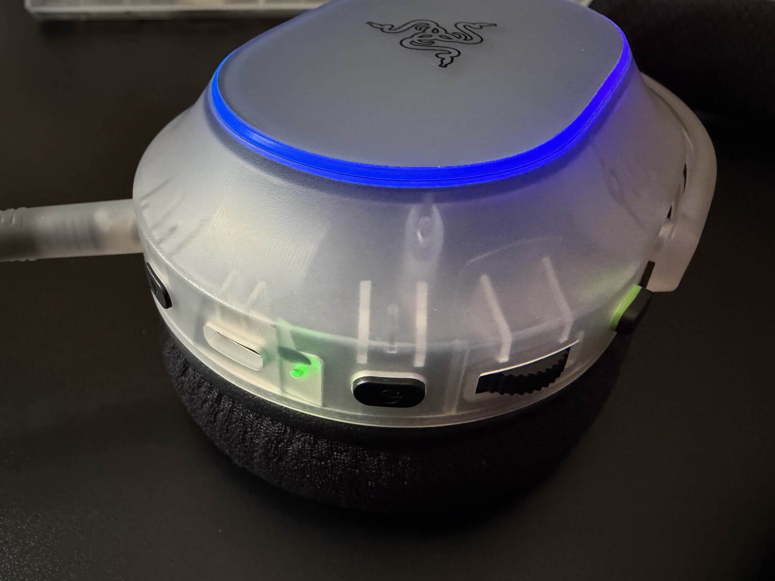 close up of one of the ear cups from the headset, showing off the transparency feature